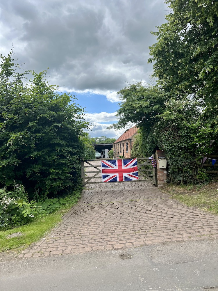 flag on a village gate