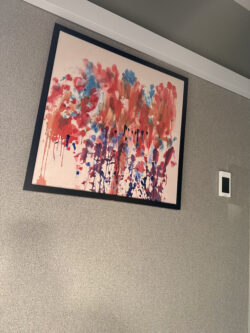 the artwork in a hotel bedroom